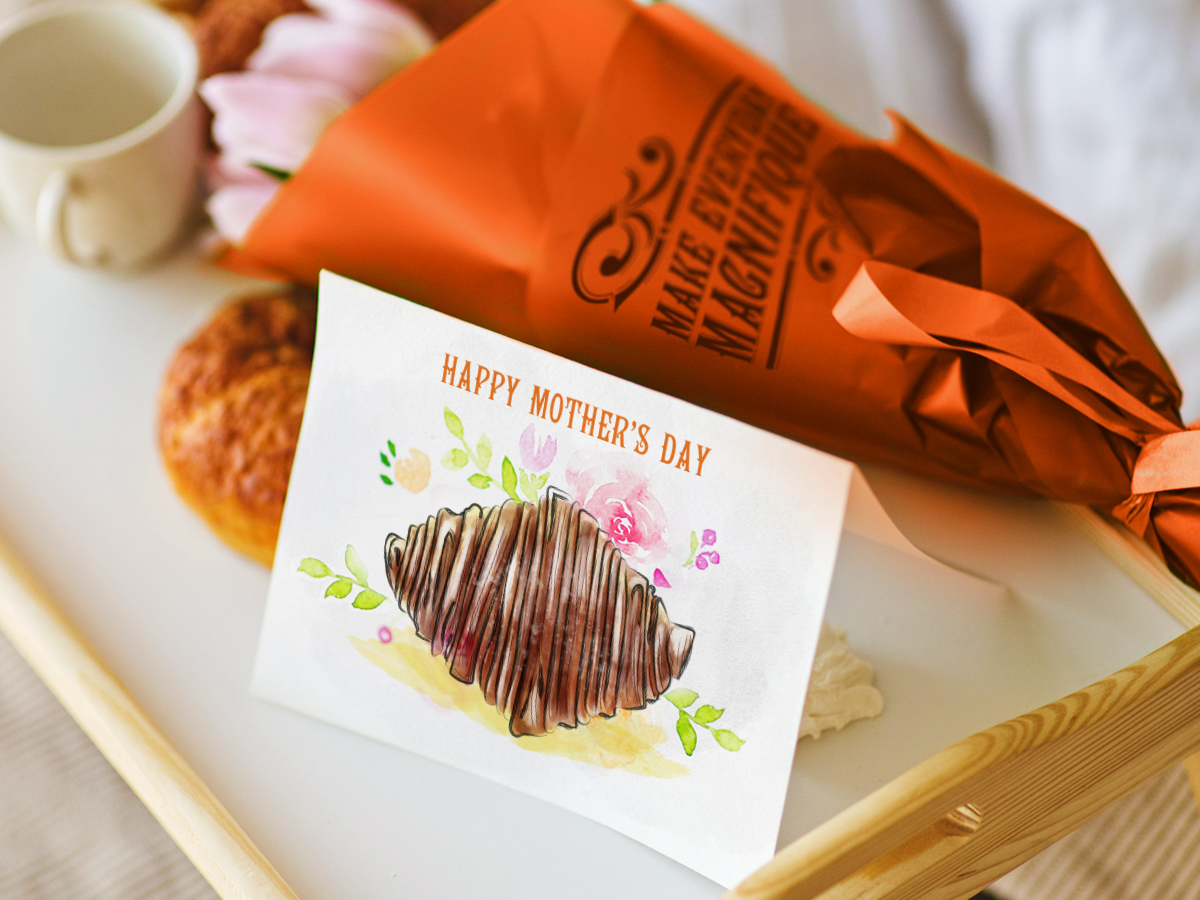 Handmade greeting card and breakfast in bed for Mother's Day